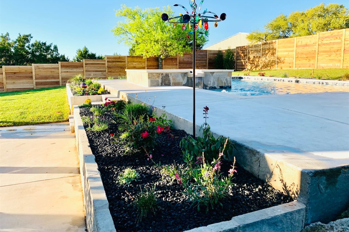 Newly landscaped yard, fencing and more. We're excited to share our happy home with you!