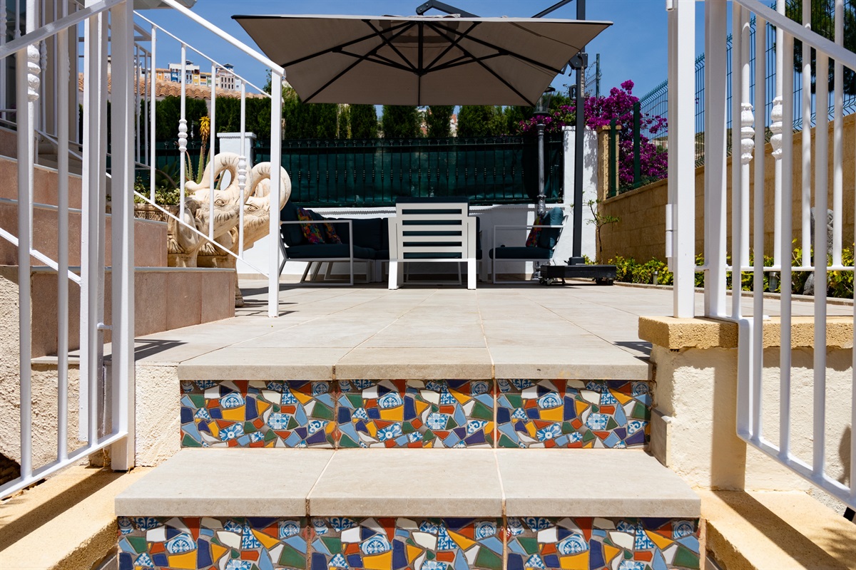 Lounge set at the villa seen from the stairs